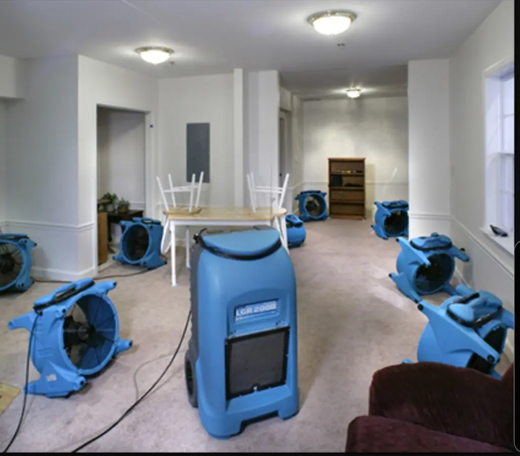 Air movers and dehumidifier setup for Water Damage Restoration in Lavon